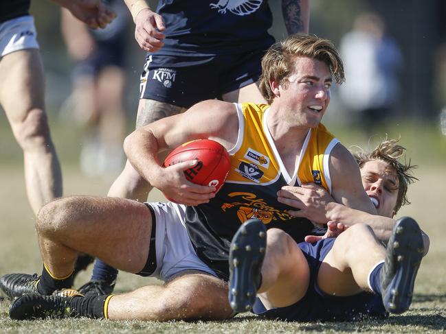 Frankston YCW’s Michael Debenham with the ball. Picture: Valeriu Campan