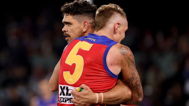 Mitch Robinson and Charlie Cameron celebrate a goal during the Lions’ clash with Melbourne. Picture: Getty Images