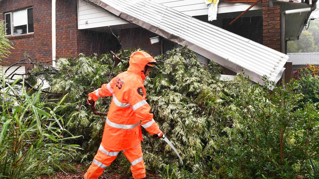 State Emergency Services start the clean-up after wild storms in Beerwah on the Sunshine Coast this morning. Picture: Patrick Woods.