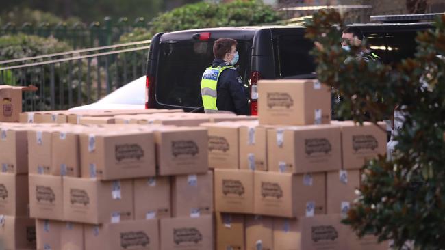 Boxes of supplies outside the locked down towers on Racecourse Road. Picture: David Crosling