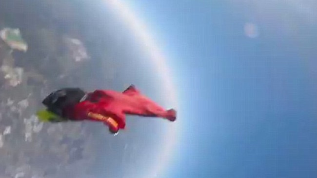 The moment of impact as the skydiver in red hits Sebastian Leal 14,000 feet above the ground. Picture: Sebastian Leal