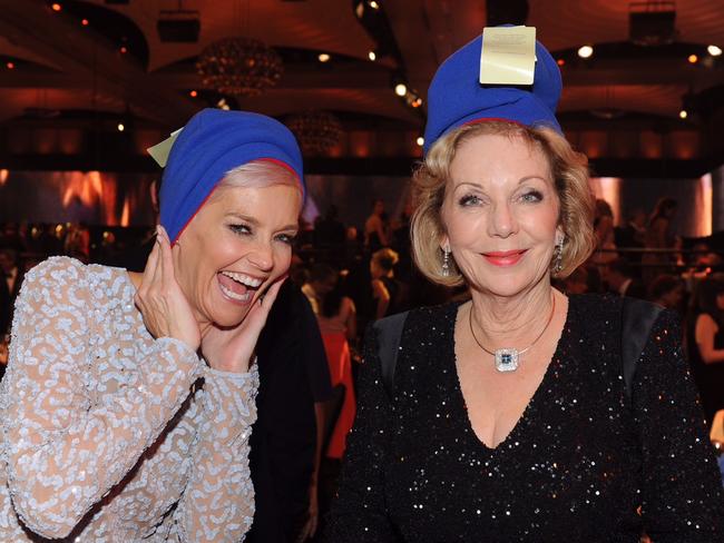 Ita and Jessica Rowe - both wearing beanies - after Carrie’s speech. Credit: TV Week.