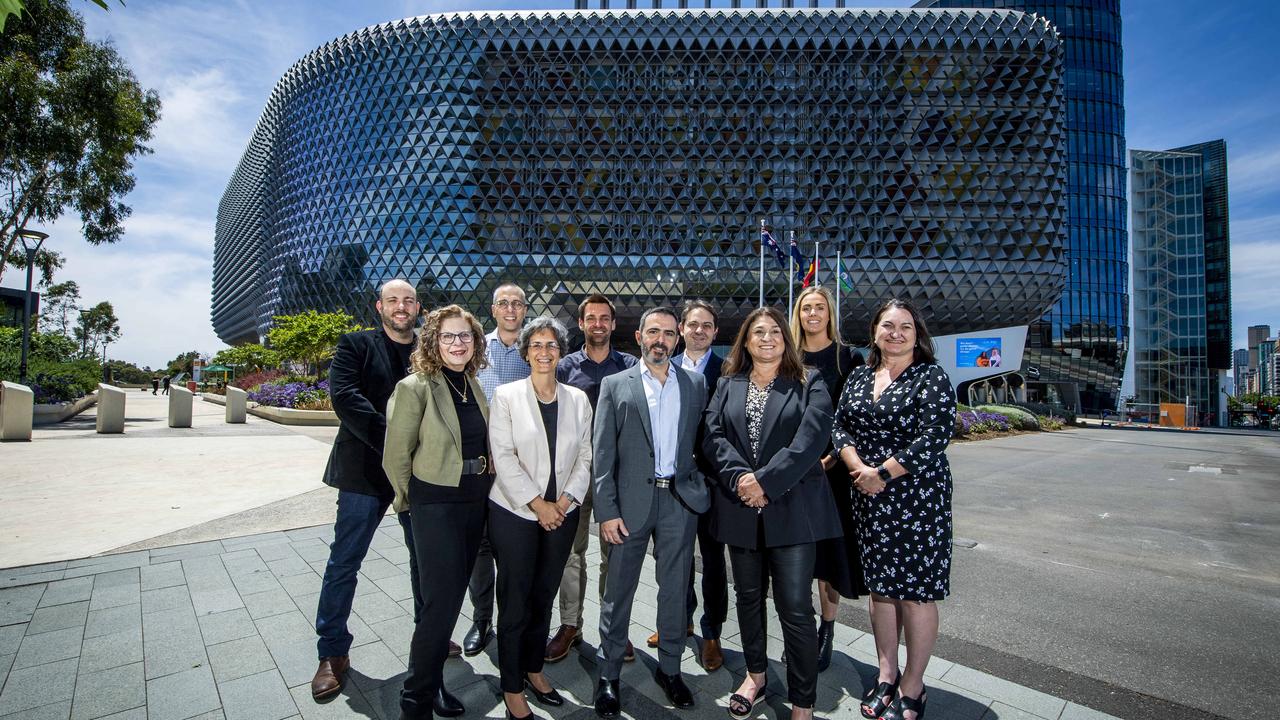 SAHMRI team members (L-R) Professor Stuart Brierley, Professor Deb White, Dr Tim Sargeant, Professor Maria Makrides, Associate Professor Cedric Bardy, Chady Barkil, Professor Peter Psaltis, Kim Morey, Olivia Ryan and Professor Caroline Miller out front of the SAHMRI centre celebrating ten years. Picture: Mark Brake