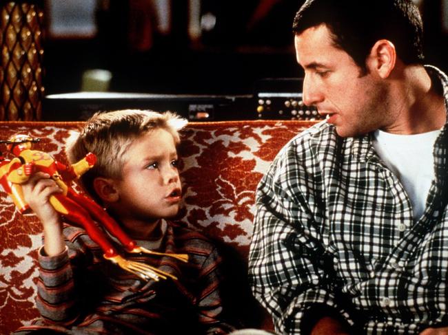 Cole Sprouse and Adam Sandler in a scene from Big Daddy.