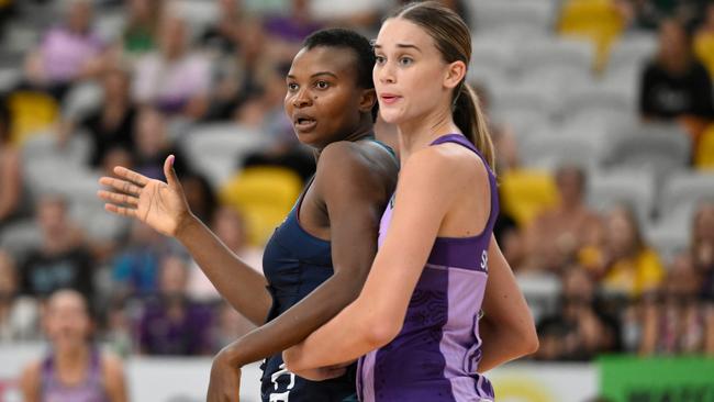 Isabelle Shearer (right) playing for the Firebirds earlier this year.