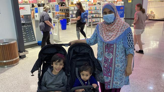 Adelaide Moon Ali with her children Zunair and Rida Ali outside Dubbo's Kmart store. Picture: Ryan Young