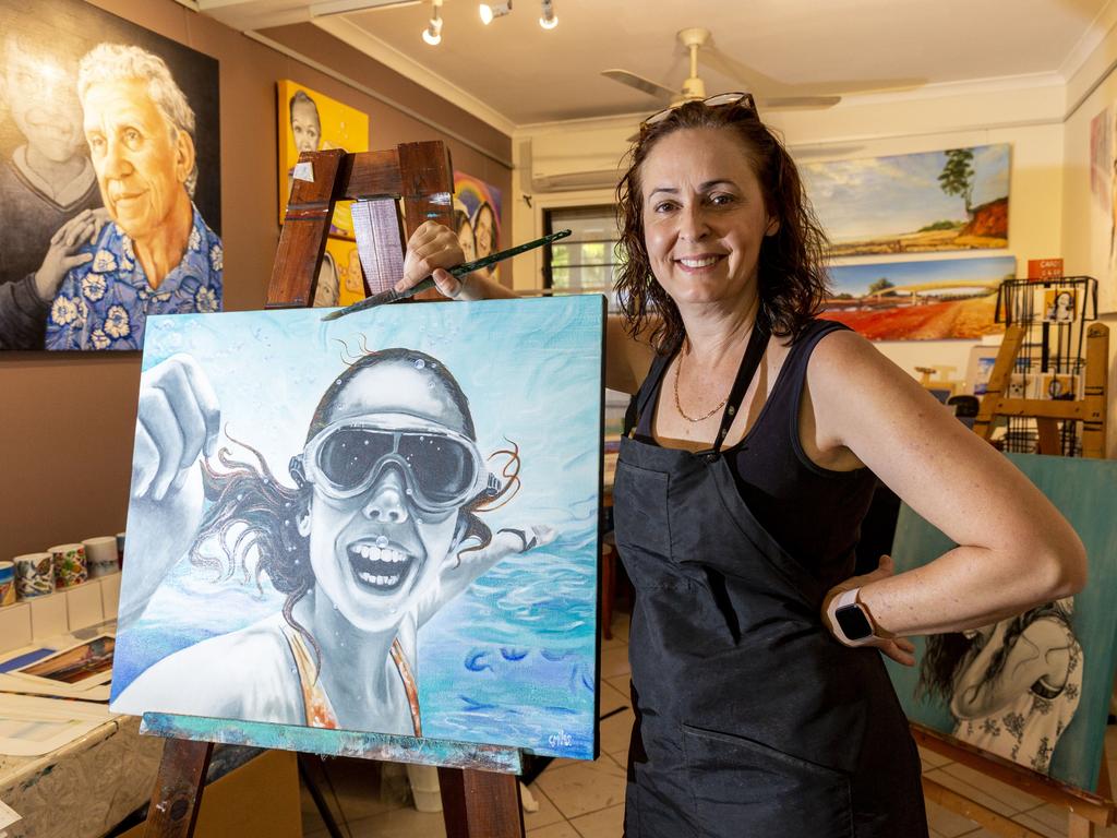 Catherine Miles is one of seven artists apart of the Rapid Creek Artists Collective who have their work displayed in the Darwin Festival exhibition. Picture: Floss Adams.