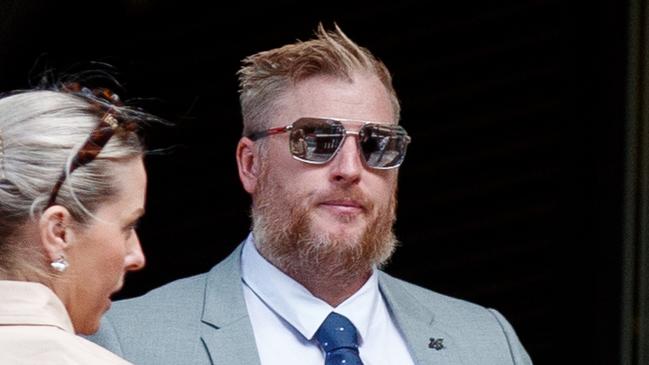 Bjorn Lensmand Holston leaves the Downing Centre District Court on Thursday after appealing two convictions for perverting the course of justice and modifying restricted data. Picture: NewsWire / Nikki Short