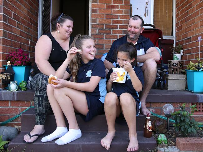 Hayley Orchard and partner Brad Menzies worked hard to get their daughters Sienna, 10, and Lily, 8, back after they were removed by FACS. Picture: Sam Ruttyn