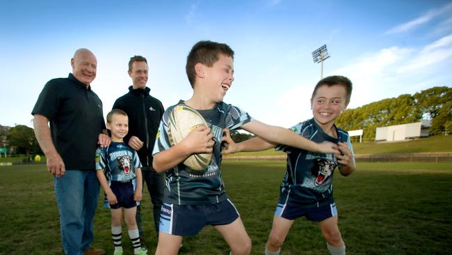 Bob Fulton with son Brett and grandsons Jake and Kobe (when aged 11 and 9 respectively).