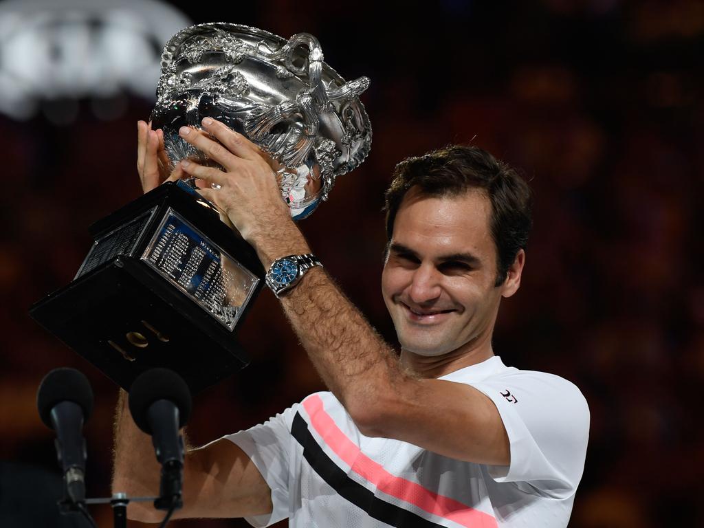 Roger Federer holds the winner’s trophy after beating Croatia’s Marin Cilic in their men’s singles final. Picture: AFP