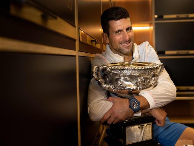 TOPSHOT - This handout picture released by Tennis Australia on January 30, 2023, shows Serbia's Novak Djokovic poses with the 2023 Australian Open men's singles final trophy at the locker room in Melbourne. (Photo by FIONA HAMILTON / TENNIS AUSTRALIA / AFP) / RESTRICTED TO EDITORIAL USE - MANDATORY CREDIT "AFP PHOTO / TENNIS AUSTRALIA / FIONA HAMILTON " - NO MARKETING NO ADVERTISING CAMPAIGNS - DISTRIBUTED AS A SERVICE TO CLIENTS