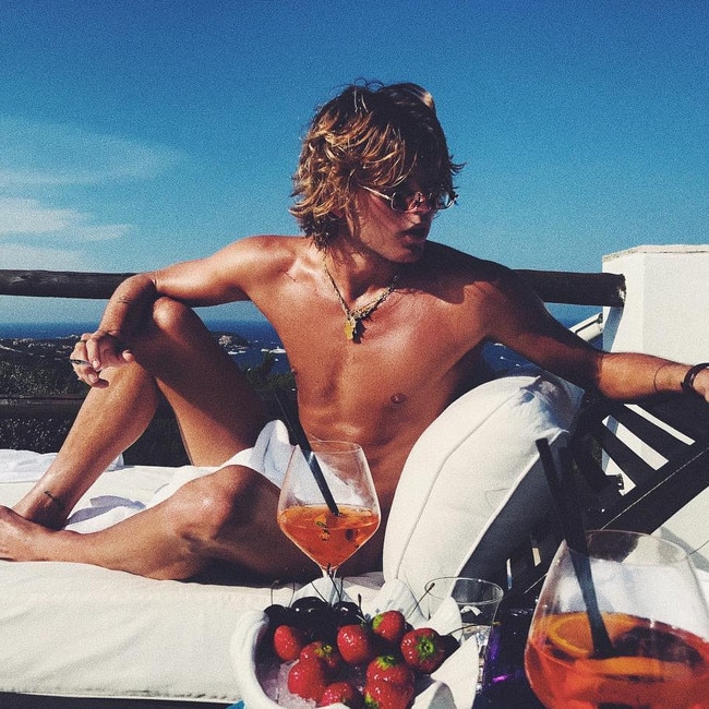 Jordan Barrett posted this snap to Instagram enjoying the sun with a view of Bryon Bay in the background.