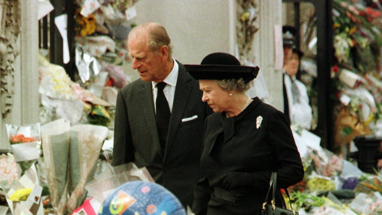 Queen Elizabeth II and the Duke of Edinburgh viewing floral tributes to Diana, Princess of Wales, after her death in 1997. Picture: AP Photo/POOL