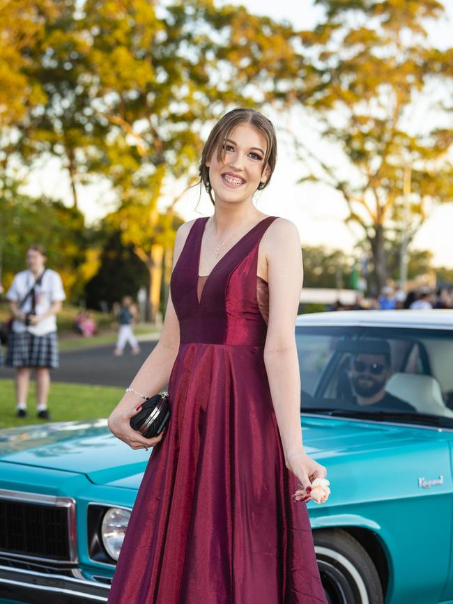 Holly Bennett arrives at Harristown State High School formal at Highfields Cultural Centre, Friday, November 18, 2022. Picture: Kevin Farmer