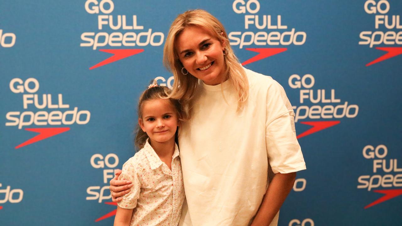 Tassie golden girl Ariarne Titmus makes a splash in Launceston meeting fan Elka Manson (7) from Launceston. Picture: Stephanie Dalton