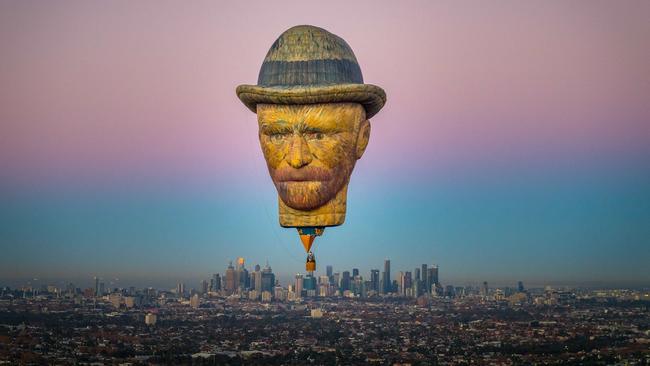 A Vincent Van Gogh balloon - visiting from Holland - takes flight over Melbourne in the lead up to the King Valley Balloon Festival. Picture: Jake Nowakowski