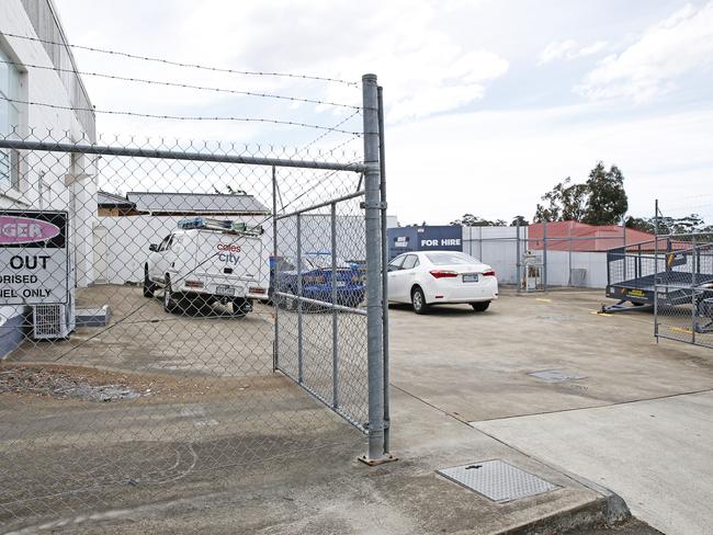 The trailer hire compound behind the petrol station in Blackmans Bay where Reid William Ludwig was allegedly murdered. Picture: ZAK SIMMONDS