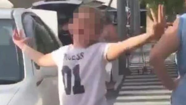 Image from a video taken of a young girl who jumped on a car at Helensvale shopping centre. Picture: supplied