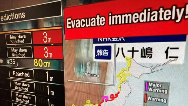 A warning message advising people to “evacuate immediately” after the earthquake. Picture: Mladen Antonov / AFP