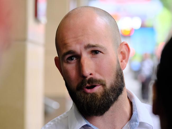 MELBOURNE AUSTRALIA - NewsWire Photos NOVEMBER 8, 2024: Prominent neo-Nazi Thomas Sewell talks to members of the media outside the Melbourne Magistrates Court.Picture: NewsWire / Luis Enrique Ascui