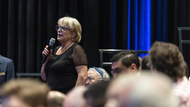 Janice Humphreys asks a question at the Toowoomba Community Safety Forum at Empire Theatres.