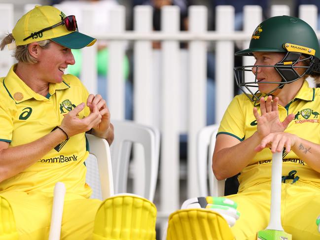 MELBOURNE, AUSTRALIA - JANUARY 14: Beth Mooney and Alyssa Healy of Australia are seen during game two of the Women's Ashes ODI series between Australia and England at Junction Oval on January 14, 2025 in Melbourne, Australia. (Photo by Robert Cianflone/Getty Images)