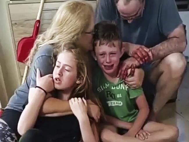 A still from video shows an unidentified Israeli family held hostage by Hamas militants. The video was shared on 09-10-2023 by the Israel Foreign Ministry in a blurred form - https://twitter.com/Israel/status/1711016332089606406This unblurred version was retrieved on 08-10-2023.