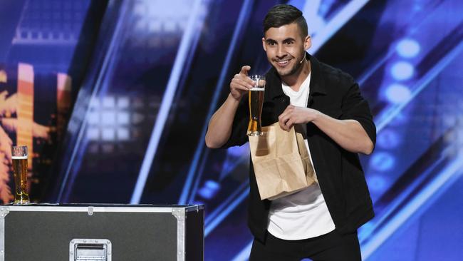 Aussie beer magician Dom Chambers performs his beer tricks on America's Got Talent. Picture: Foxtel