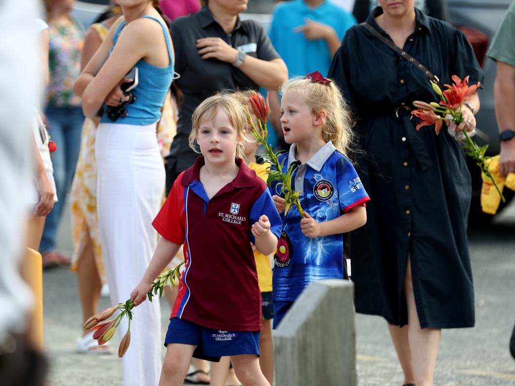 Hundreds of people have gathered at Bribie Island for a vigil to honour 17-year-old shark attack victim Charlize Zmuda. Picture: David Clark