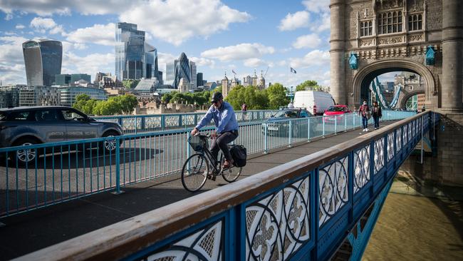 Commuters cross London’s Tower Bridge during the evening rush hour. Picture: Getty Images