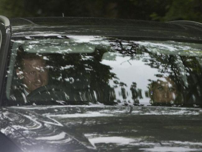 Prince Harry, in an Audi, drives his girlfriend, the American actor Meghan Markle, to the wedding reception of Pippa Middleton and her husband James Matthews. Picture: News Group Newspapers Ltd.