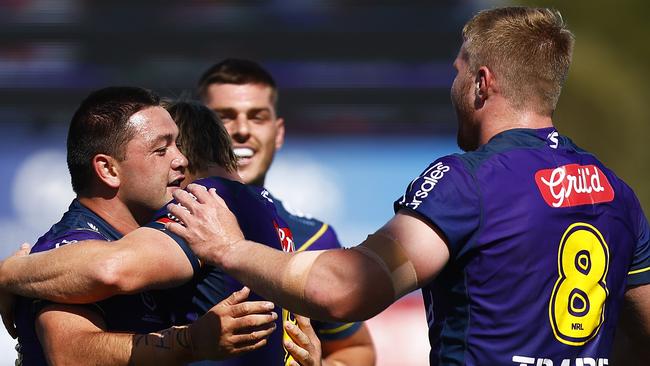 MELBOURNE, AUSTRALIA - FEBRUARY 19: Brandon Smith of the Storm (L) celebrates a try during the NRL Trial match between the Melbourne Storm and the New Zealand Warriors at Casey Fields on February 19, 2022 in Melbourne, Australia. (Photo by Daniel Pockett/Getty Images)