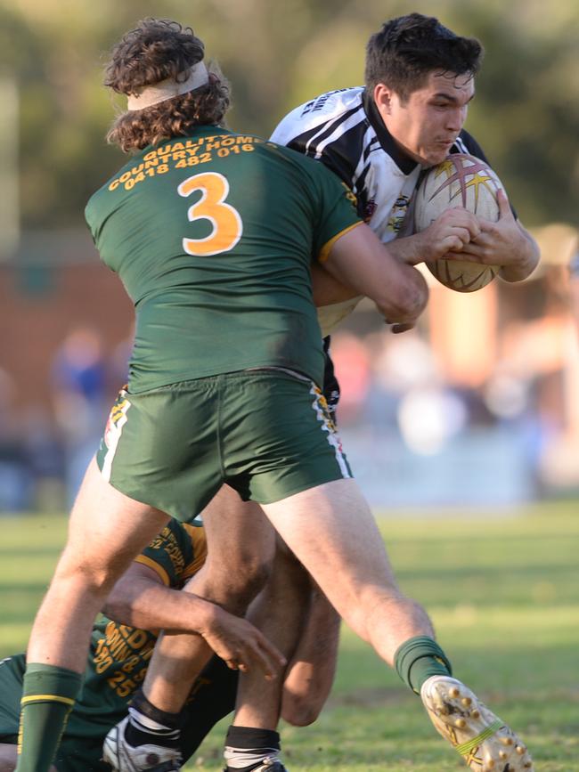 Blake Matthews is wrapped up by the Mittagong defence. Picture: Ian Svegovic