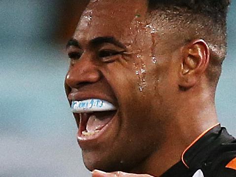 Tigers' Kevin Naiqama celebrates scoring a try during NRL match Wests Tigers v Parramatta Eels at ANZ Stadium. picture. Phil Hillyard