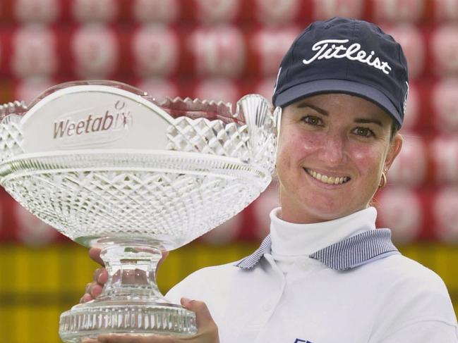 Golf - golfer Karrie Webb holding trophy after winning Women's British Open tournament in Turnberry, Scotland 11 Aug 2002.  womens