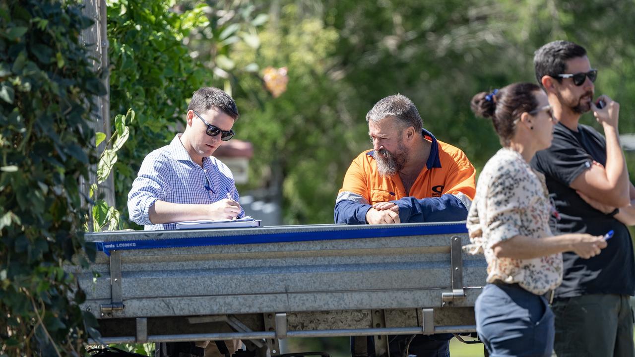 Detectives walk door to door in Hollywood Blvd Whiterock, a suburb of Cairns, interviewing residents on the stabbing death of a man in the street overnight. Picture: NCA NewsWire / Brian Cassey