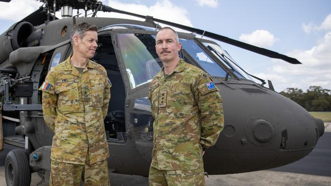 Major General Jeremy King, left, and Colonel Brenton Mellor with a Black Hawk. Picture: Liam Mendes