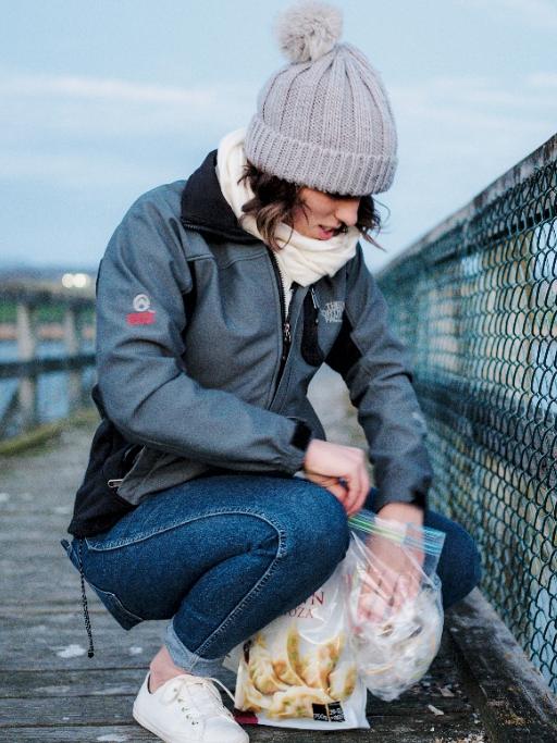 IMAS researcher Lillian Stewart collecting samples of boluses, or gull spews, for samples. Picture: IMAS