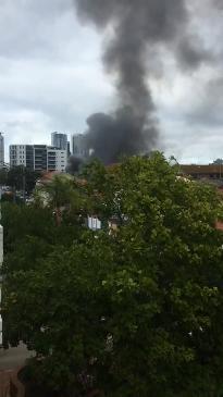 Smoke billows from a Southport house fire