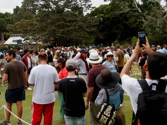 SYDNEY, AUSTRALIA - NewsWire Photos JANUARY 23, 2025: People line up to catch a glimpse of the Corpse flower, Bunga Bangkai, as it begins to bloom in Sydney for the first time in fifteen years. Picture: NewsWire / Nikki Short