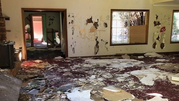 The inside of the once beautiful mansion has been destroyed with all power points ripped out of the walls. PHOTO 9 News