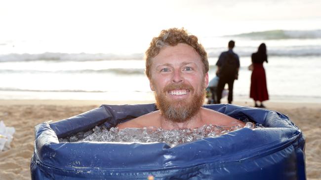 Andre Garraud from Conscious Community take their first ice bath of 2025. Picture: NewsWire / Christian Gilles