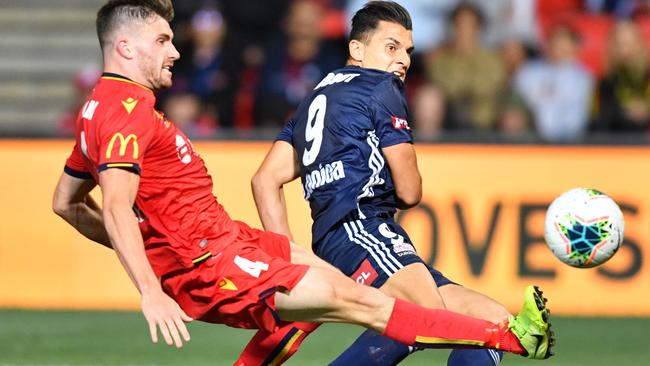 Andrew Nabbout of the Victory, right, was denied an equaliser in stoppage time. Picture: AAP