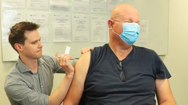 Northbridge Medical Centre GP Rob Nelson in Sydney’s north shore administers a COVID-19 vaccine to Viv Collard on Monday. Picture: John Feder