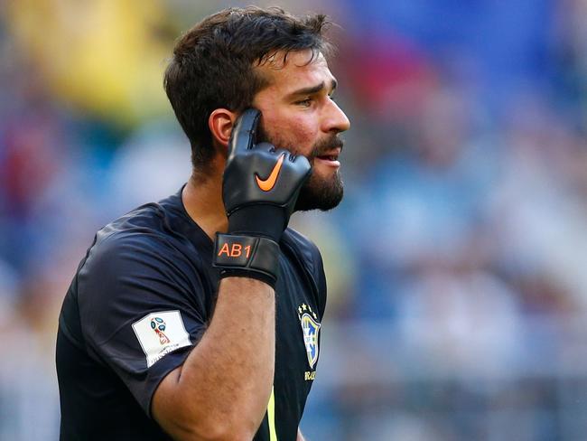 Brazil's goalkeeper Alisson reacts during the Russia 2018 World Cup round of 16 football match between Brazil and Mexico at the Samara Arena in Samara on July 2, 2018. / AFP PHOTO / BENJAMIN CREMEL / RESTRICTED TO EDITORIAL USE - NO MOBILE PUSH ALERTS/DOWNLOADS