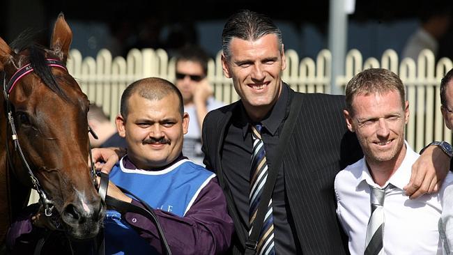 Former Socceroos Craig Moore (right) and Zeljko Kalac with Buffering. Picture: Peter Bull