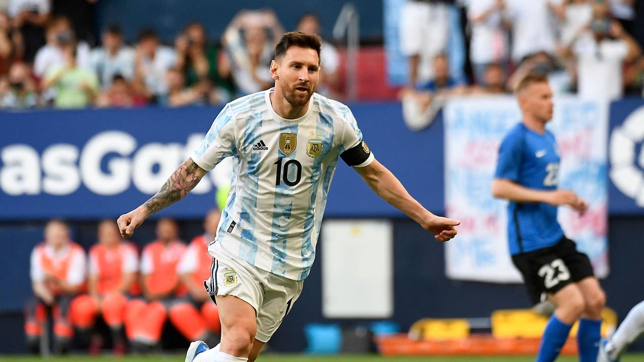Argentina's forward Lionel Messi celebrates after scoring his team's first goal during the international friendly football match between Argentina and Estonia at El Sadar stadium in Pamplona on June 5, 2022. (Photo by ANDER GILLENEA / AFP)