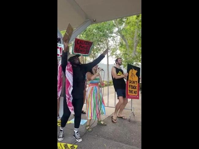 Protestors outside NT Resources Week event held at the Darwin Convention Centre