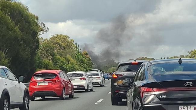 Southbound traffic on the Bruce Hwy after the car caught fire. Picture: Joanne McCabe